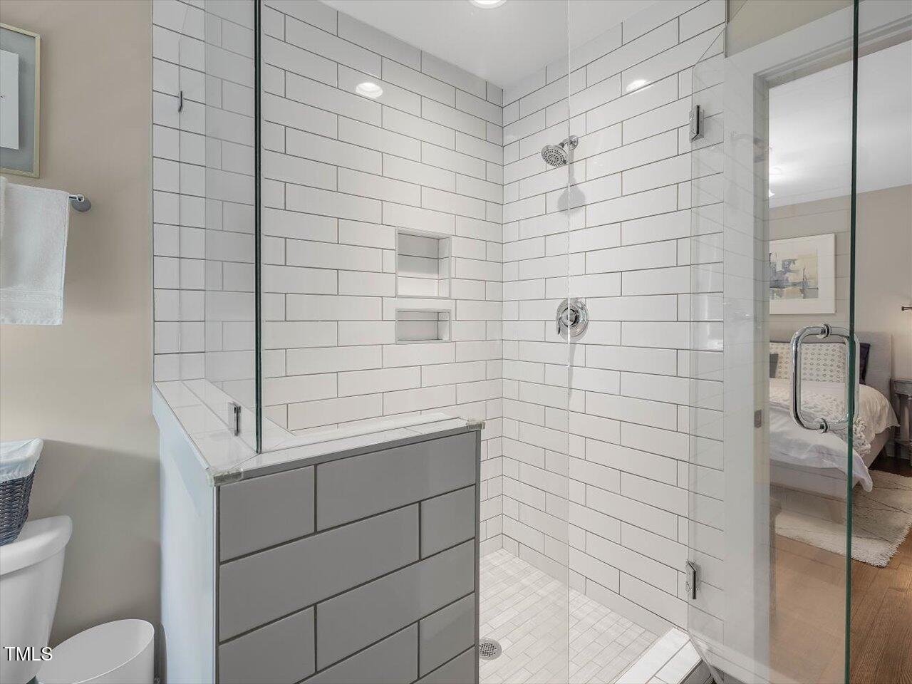 1310 Carolina Pines Avenue Raleigh, NC 27603 - Photo 35 of 53 a bathroom with a shower and toilet