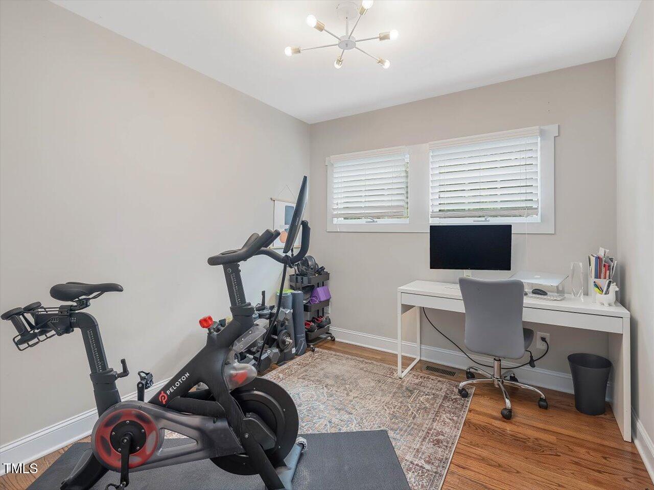 1310 Carolina Pines Avenue Raleigh, NC 27603 - Photo 41 of 53 a view of a room with gym equipment