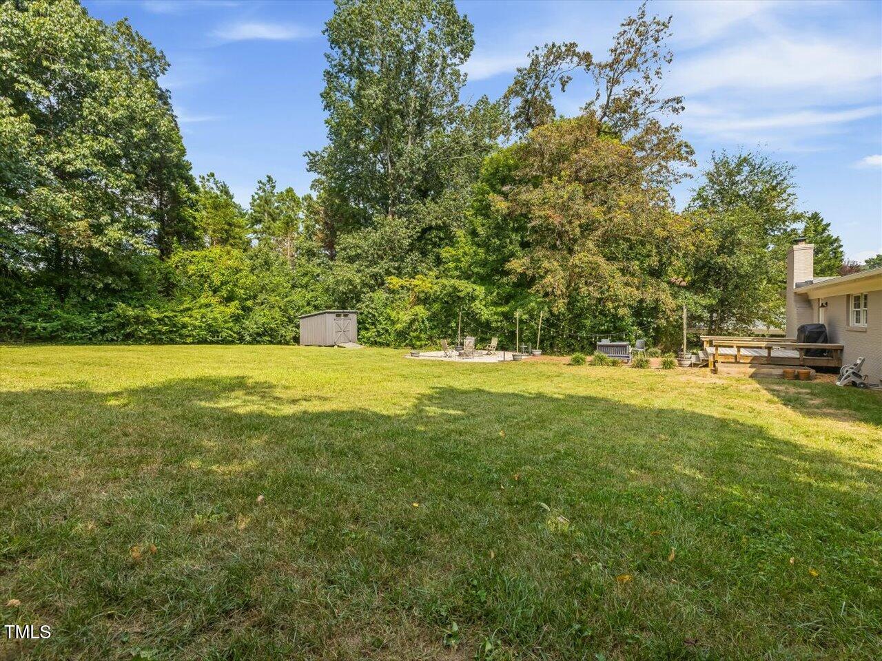 1310 Carolina Pines Avenue Raleigh, NC 27603 - Photo 49 of 53 a view of outdoor space with garden and trees