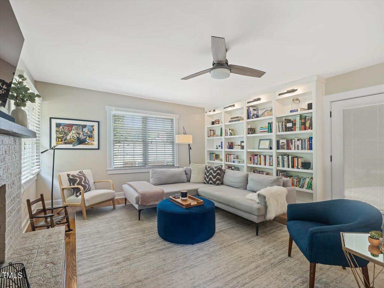 1310 Carolina Pines Avenue Raleigh, NC 27603 - Photo 6 of 53 a living room with furniture and a large window