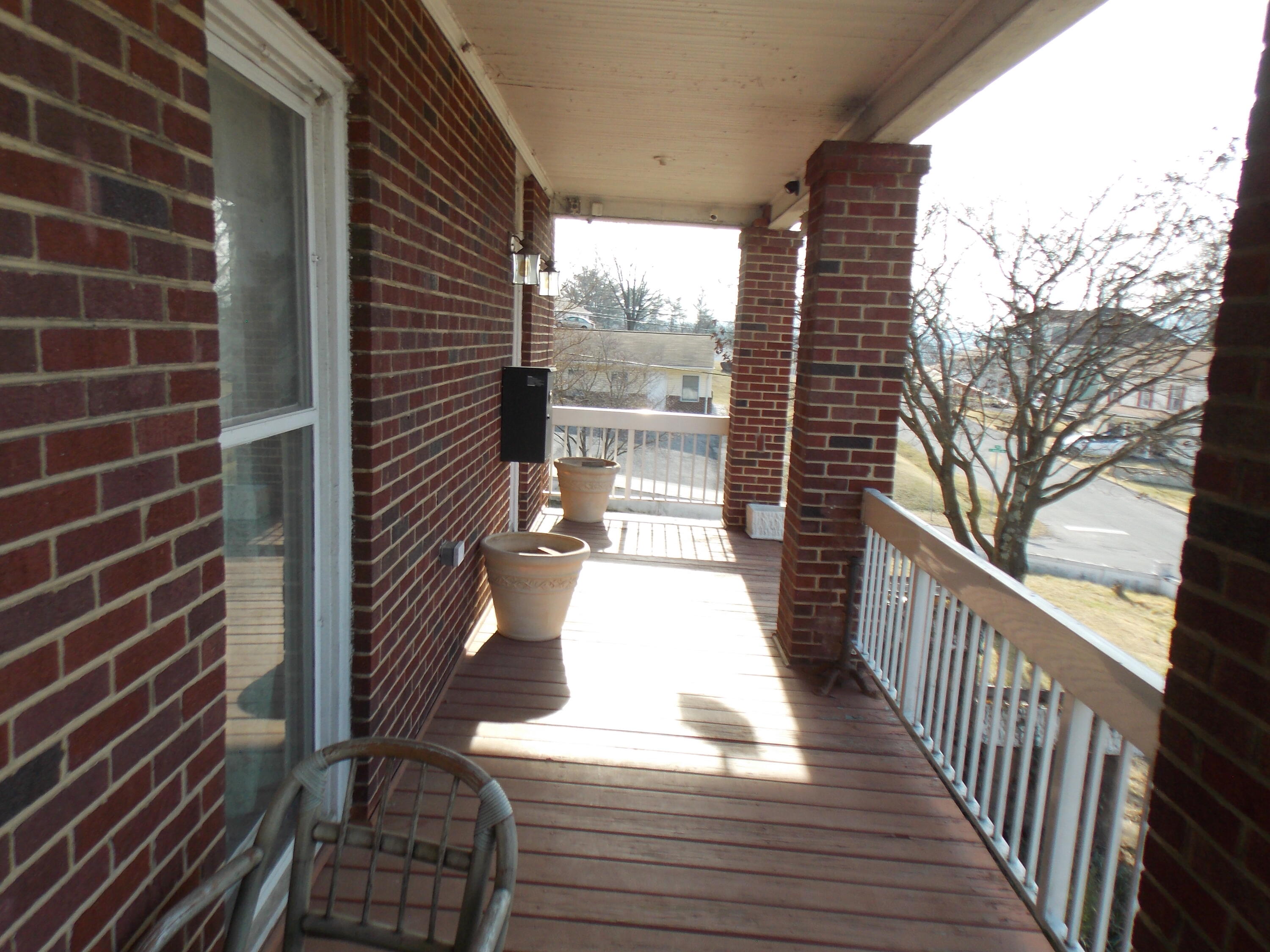 624 South Maple Street Vinton, VA 24179 - Photo 14 of 43 a view of a balcony with wooden floor