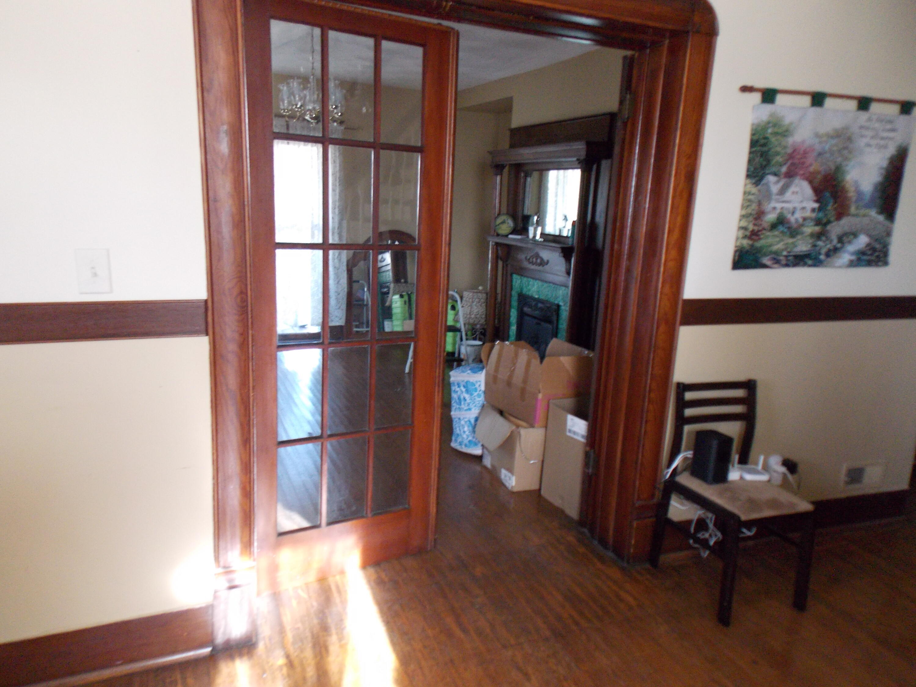 624 South Maple Street Vinton, VA 24179 - Photo 16 of 43 a view of a hallway with wooden floor and furniture