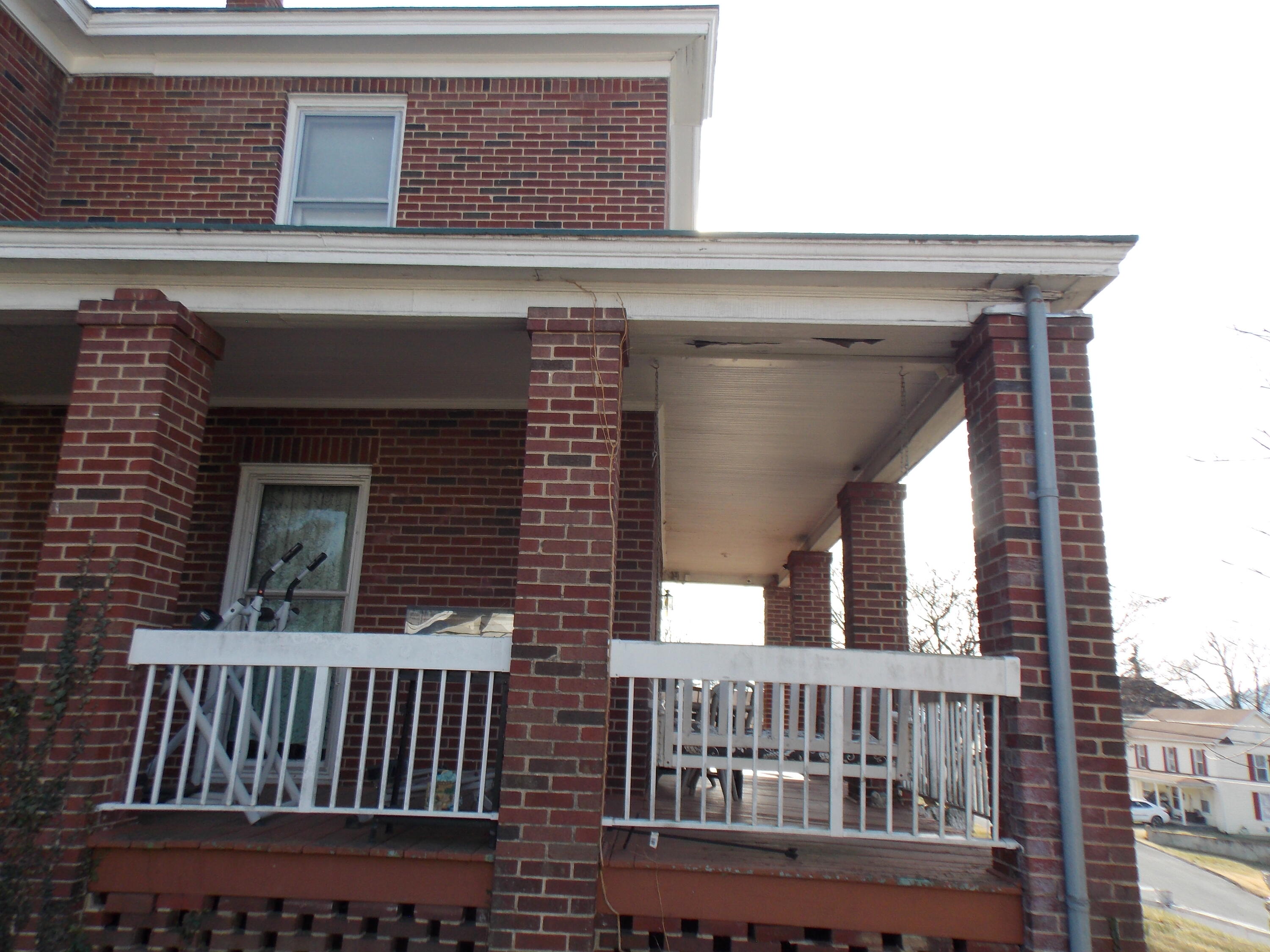 624 South Maple Street Vinton, VA 24179 - Photo 2 of 43 a view of deck with a chair and a floor to ceiling window