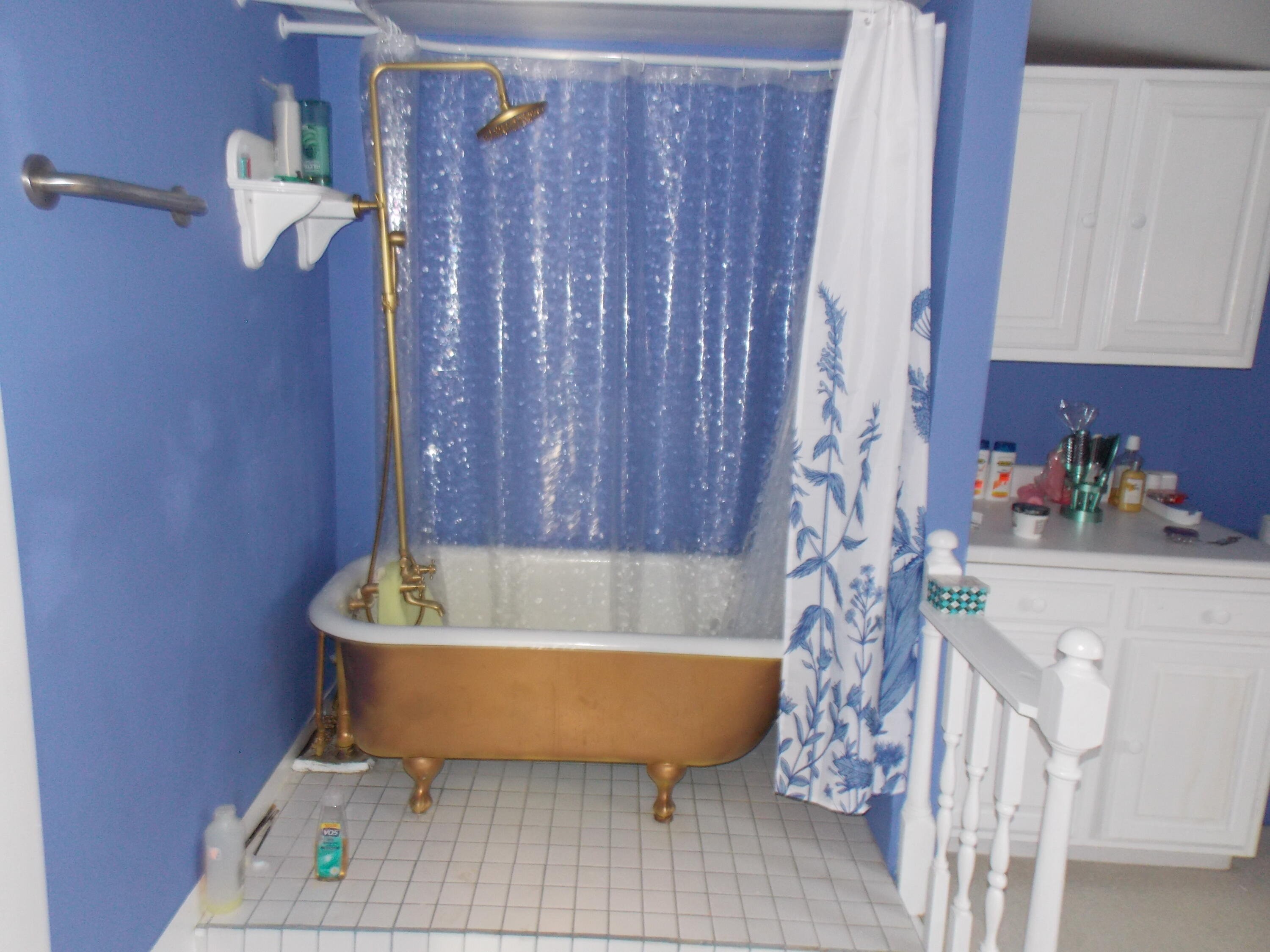 624 South Maple Street Vinton, VA 24179 - Photo 28 of 43 a bath tub sitting next to a white sink and a window