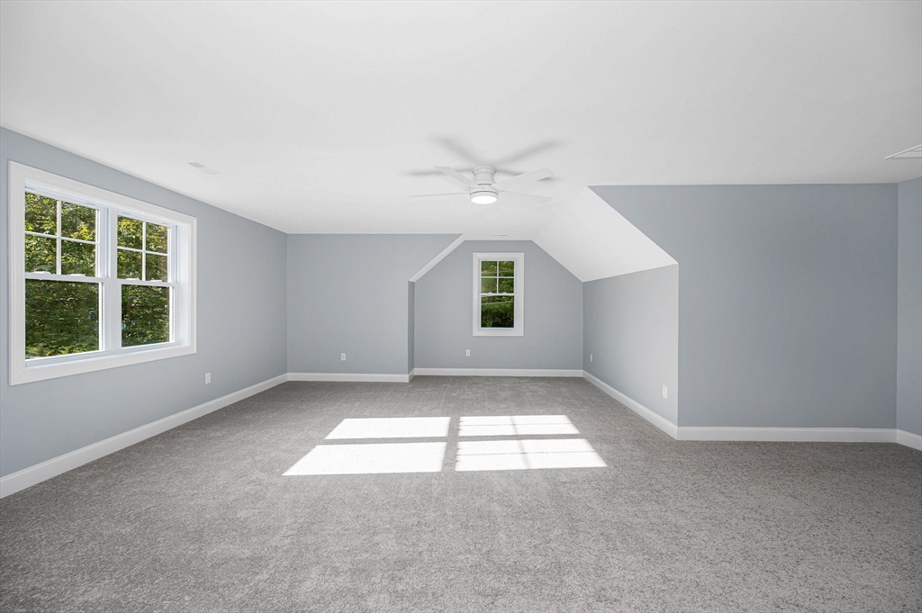 17 Norris Road Tyngsborough, MA 01879 - Photo 18 of 42 an empty room with windows and entrance