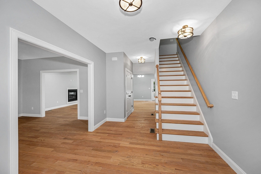 17 Norris Road Tyngsborough, MA 01879 - Photo 2 of 42 a view of an entryway with wooden floor