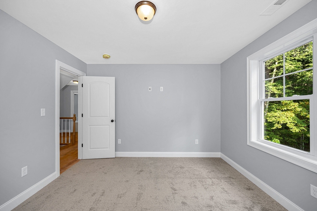 17 Norris Road Tyngsborough, MA 01879 - Photo 23 of 42 a view of a livingroom with a large window