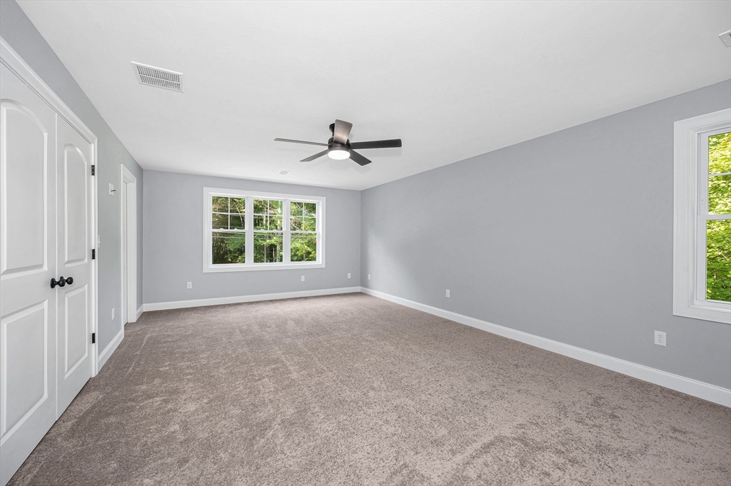 17 Norris Road Tyngsborough, MA 01879 - Photo 28 of 42 a view of an empty room with a window