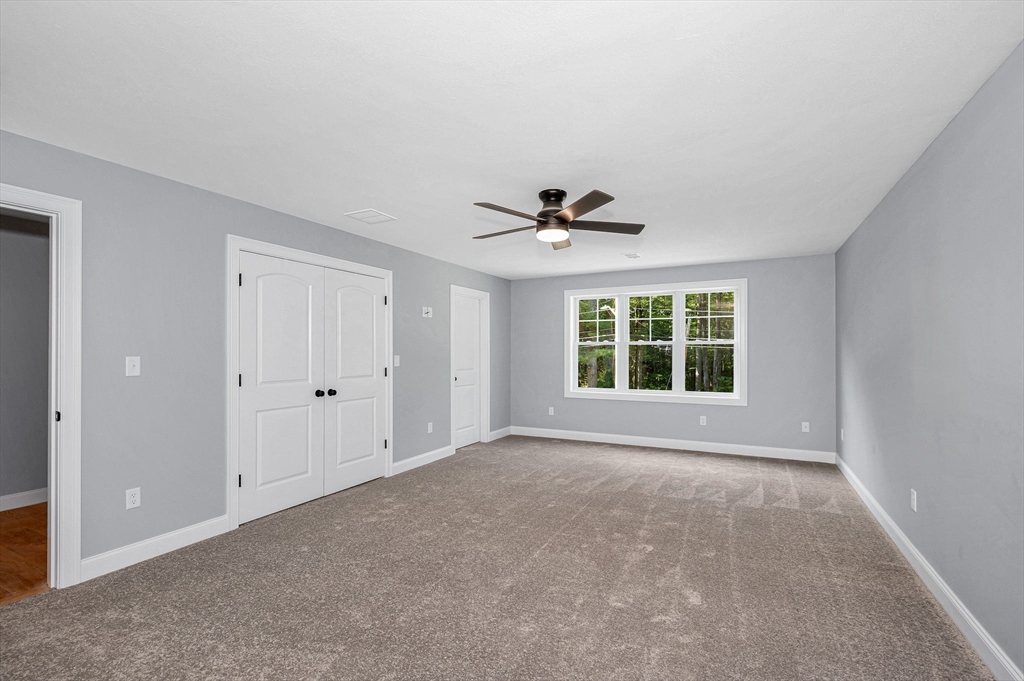 17 Norris Road Tyngsborough, MA 01879 - Photo 29 of 42 a view of an empty room with a window
