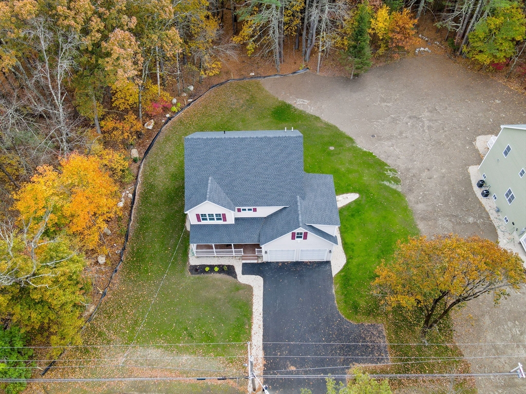 17 Norris Road Tyngsborough, MA 01879 - Photo 40 of 42 an aerial view of a house with swimming pool