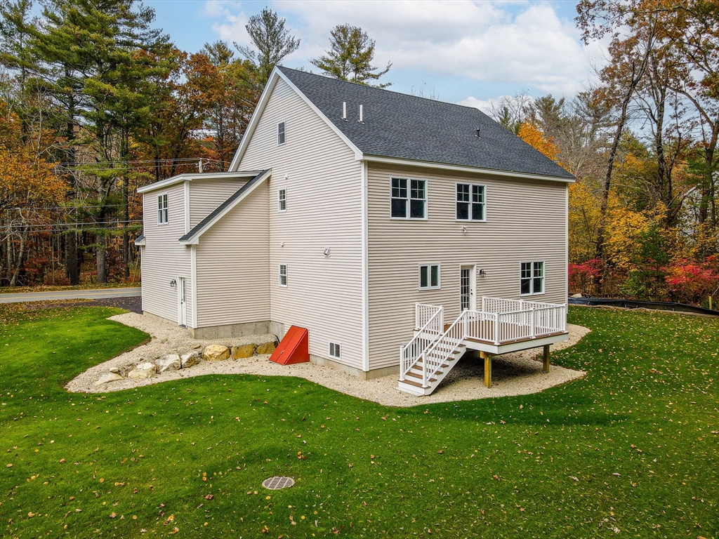 17 Norris Road Tyngsborough, MA 01879 - Photo 41 of 42 a view of a house with backyard