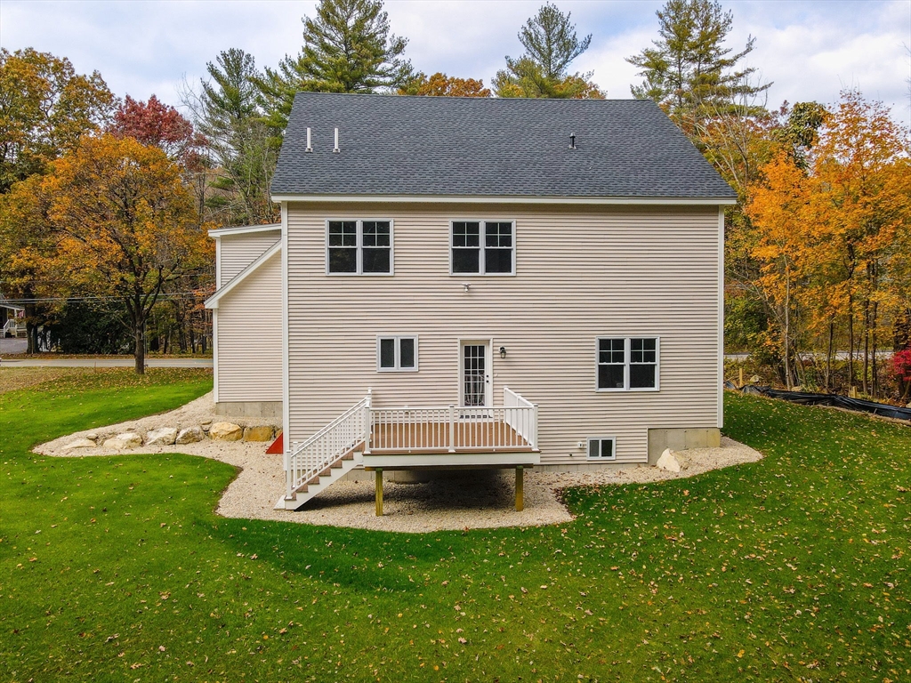 17 Norris Road Tyngsborough, MA 01879 - Photo 42 of 42 a view of a house with a yard