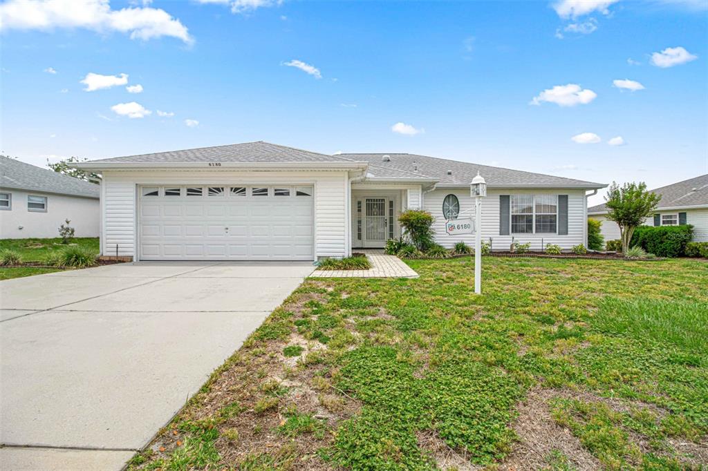 6180 Southwest 84th Place Ocala, FL 34476 - Photo 1 of 1 FRT OF HOME FACES NORTH.