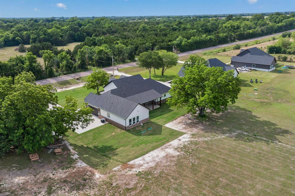 9080 County Road 669 Blue Ridge, TX 75424 - Photo 36 of 40 an aerial view of a house
