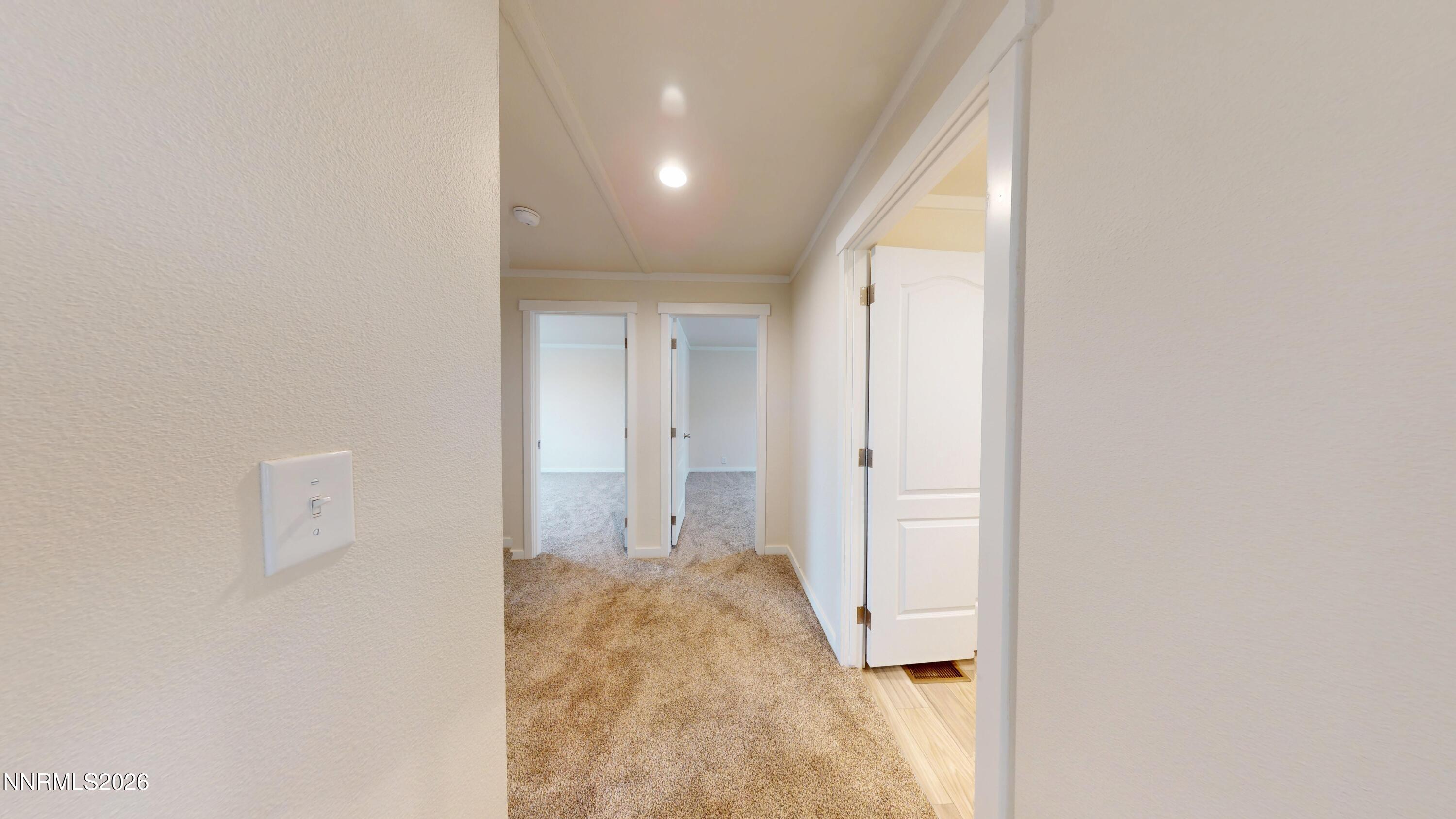 4890 Brayton Road Winnemucca, NV 89445 - Photo 14 of 20 a view of hallway with wooden floor