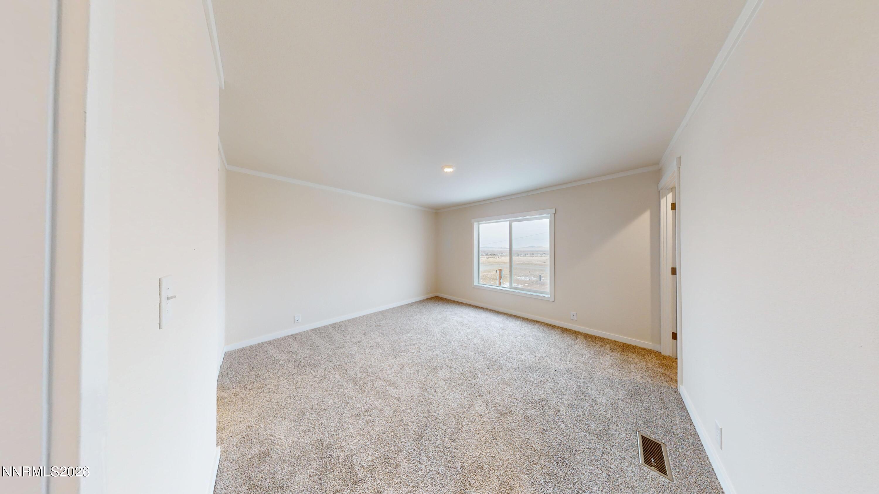 4890 Brayton Road Winnemucca, NV 89445 - Photo 15 of 20 a view of an empty room and a window