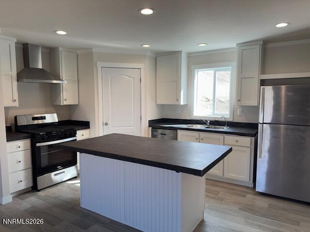 4890 Brayton Road Winnemucca, NV 89445 - Photo 7 of 20 a kitchen with granite countertop a stove and a refrigerator