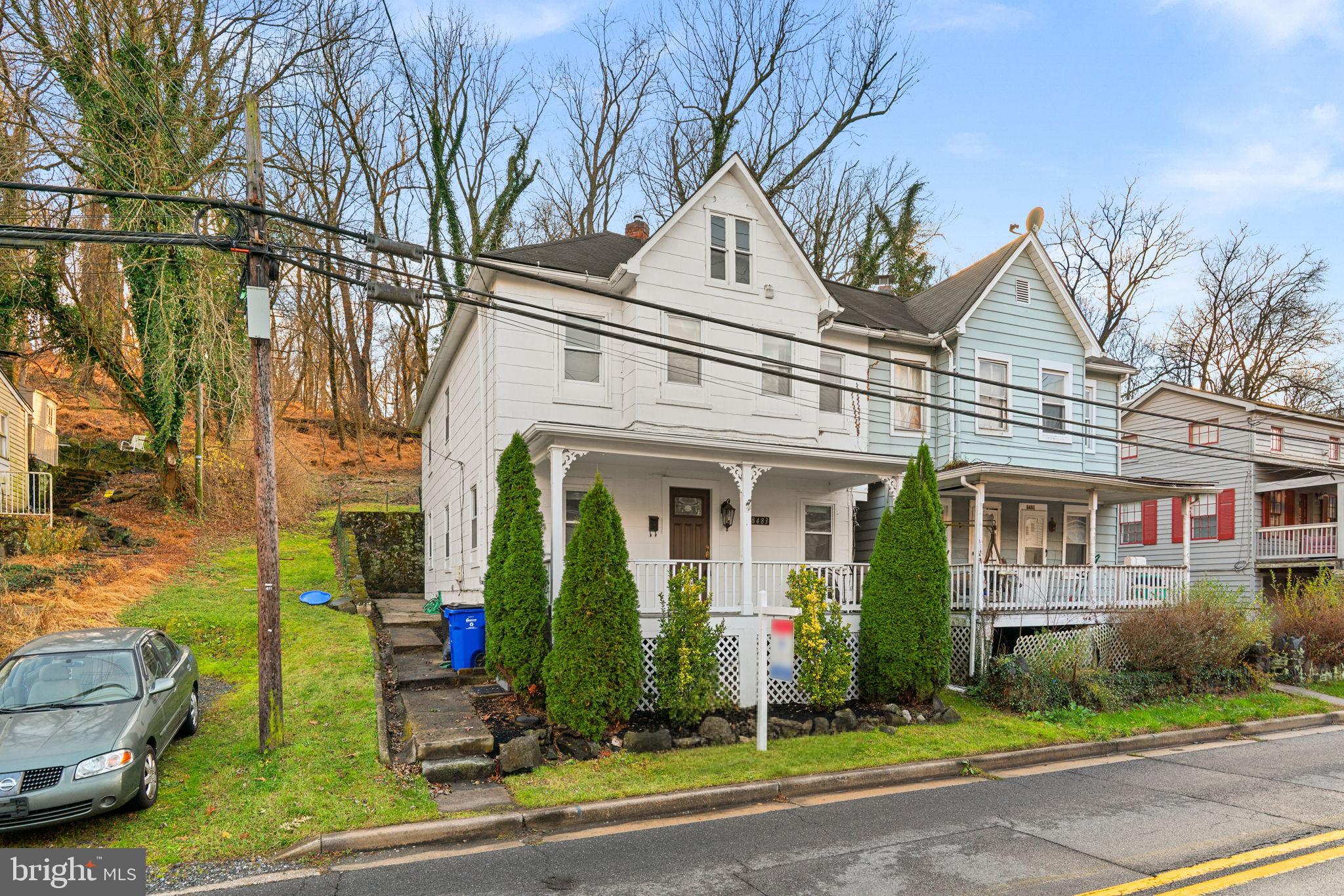 8483 Frederick Road Ellicott City, MD 21043 - Photo 1 of 44 a view of a building with a yard