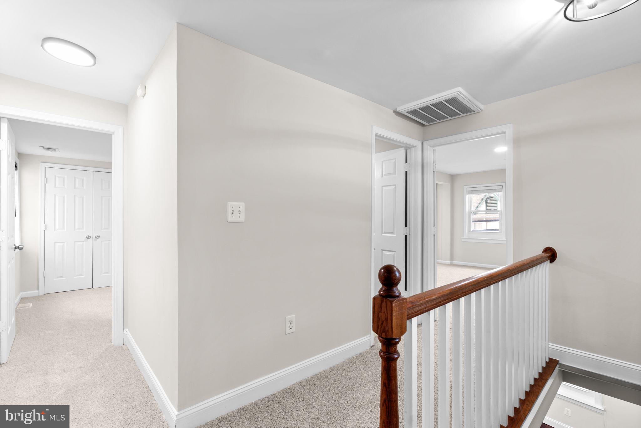 8483 Frederick Road Ellicott City, MD 21043 - Photo 16 of 44 a view of a hallway view with staircase
