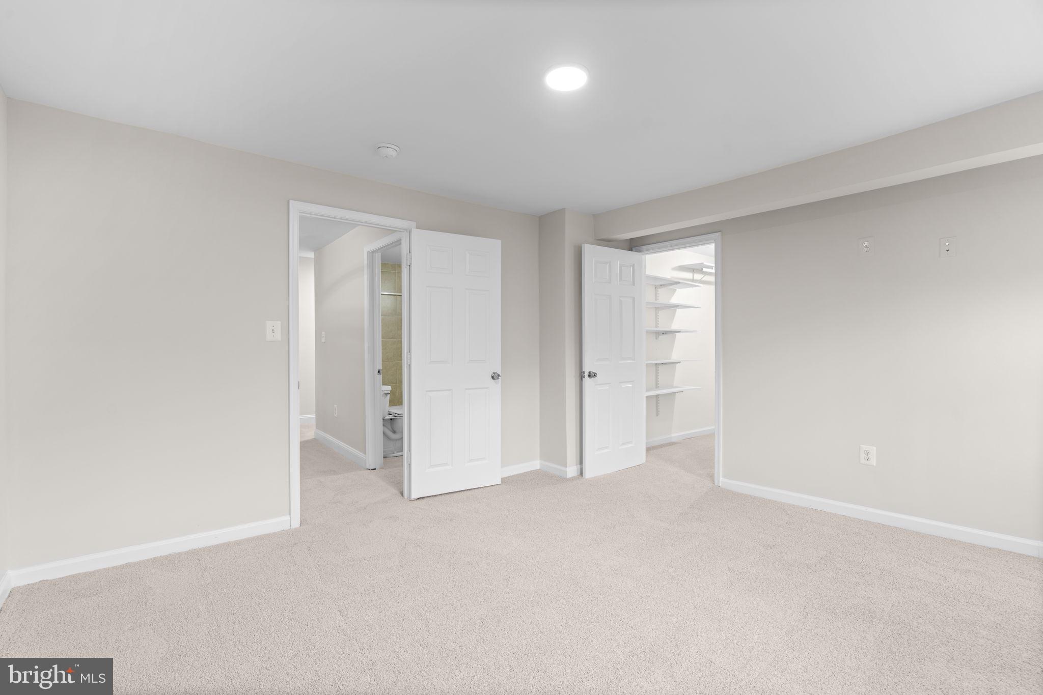 8483 Frederick Road Ellicott City, MD 21043 - Photo 19 of 44 a view of an empty room and a window