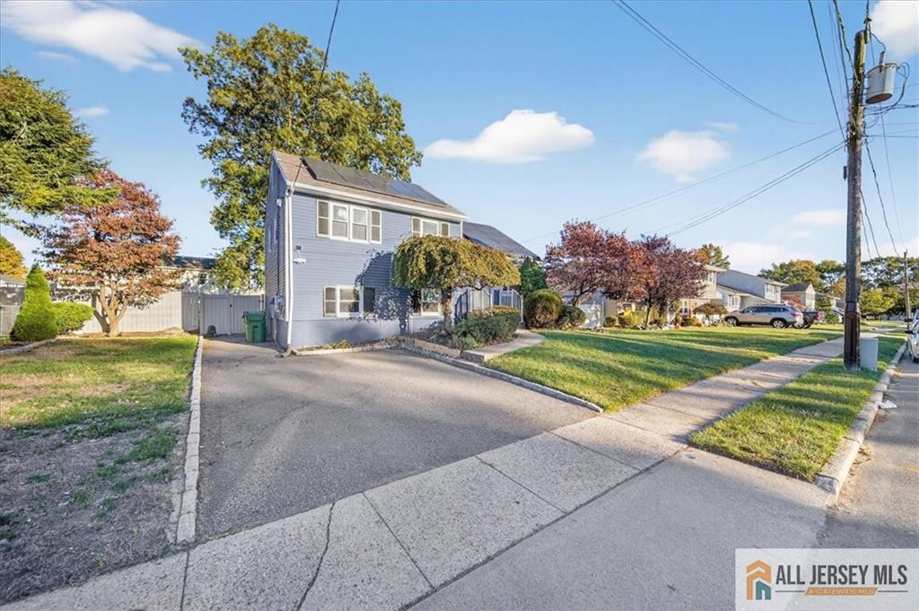 6 Dundar Road Edison, NJ 08817 - Photo 2 of 22 a view of a house with a yard and a street