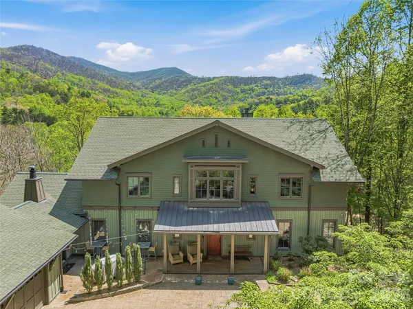 a house view with a garden space