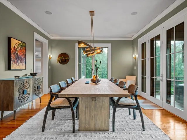 a kitchen with granite countertop lots of counter top space and dining table