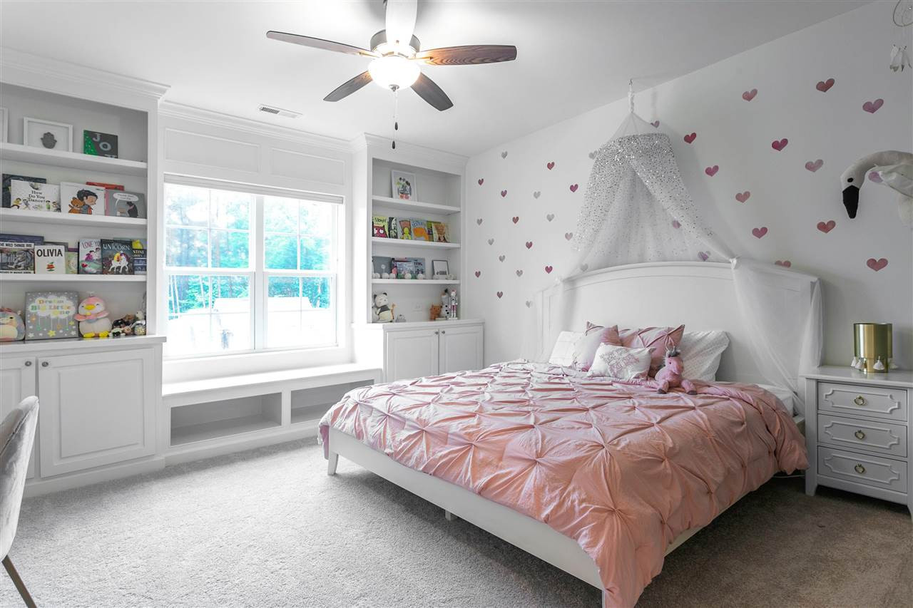 12309 Kyle Abbey Lane Raleigh, NC 27613 - Photo 17 of 30 bedroom with full ensuite and custom builtins for storage