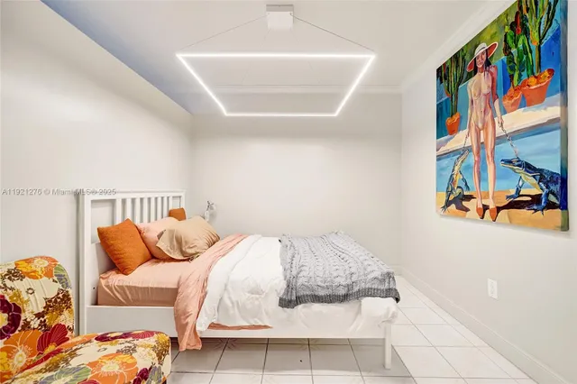 a vase of flowers sitting next to a window