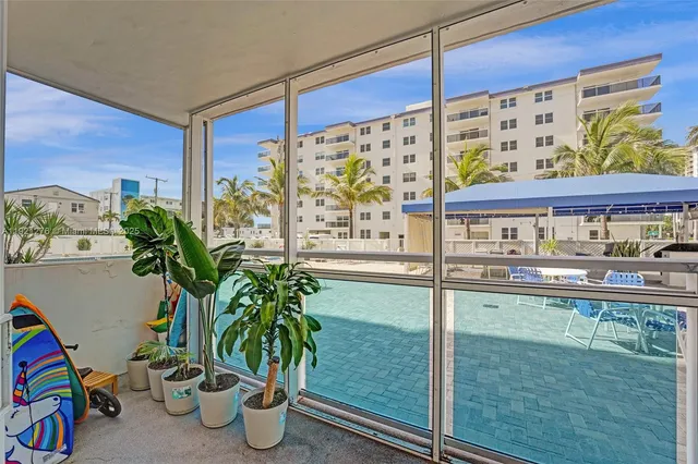 a view of a path along with potted plant
