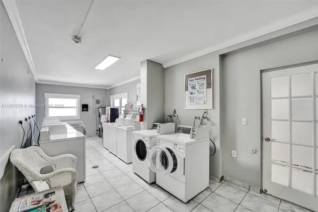 a view of a house with backyard porch and sitting area