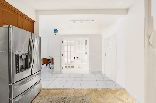 a view of a livingroom with furniture and a flat screen tv