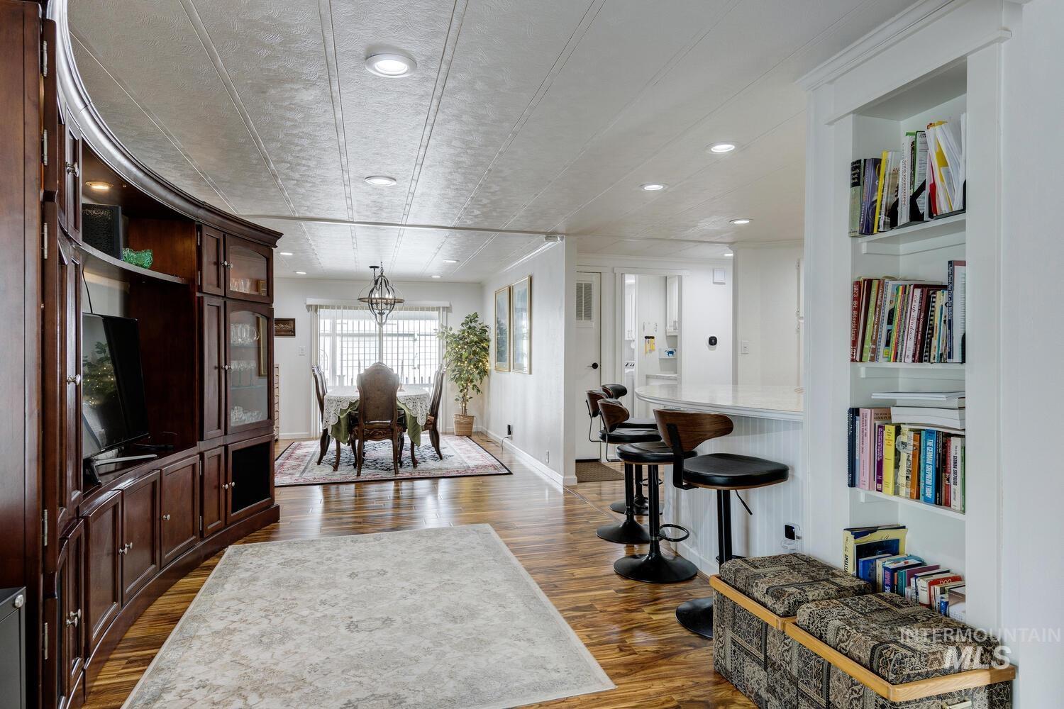 9390 West Ustick Road, Unit 64 Boise, ID 83704 - Photo 18 of 36 Dining area with dark wood-style flooring and recessed lighting