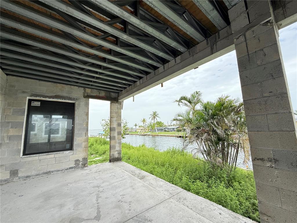234 Bangsberg Road Southeast Port Charlotte, FL 33952 - Photo 13 of 14 a view of a door of the house