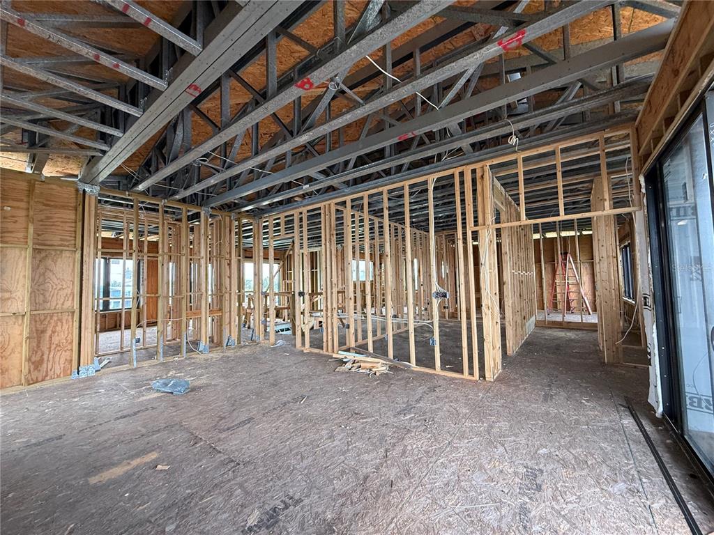 234 Bangsberg Road Southeast Port Charlotte, FL 33952 - Photo 5 of 14 a view of an empty room with stairs