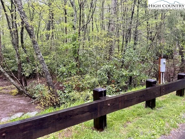 a view of balcony with wooden floor