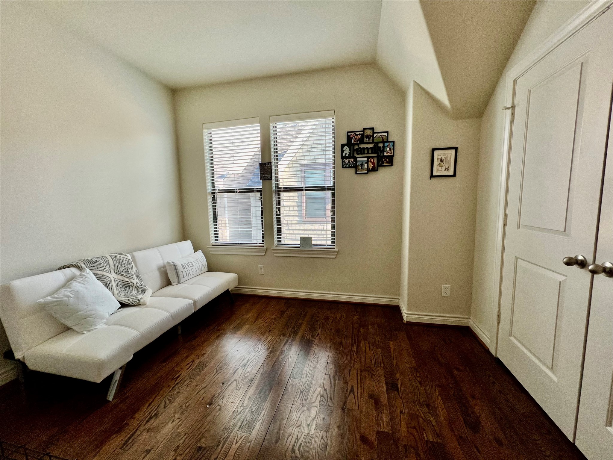 3255 Maxroy Street Houston, TX 77008 - Photo 24 of 26 Bright room on third floor with hardwood floor, featuring two windows allowing natural light, and a closet door with full bathroom.