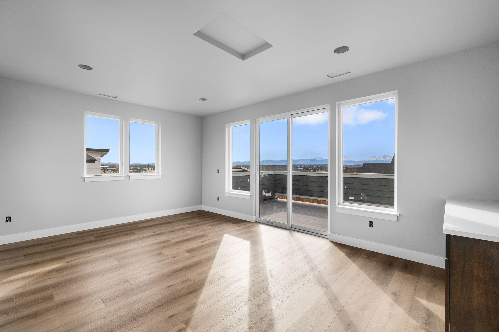 3737 Southwest 43rd Street Redmond, OR 97756 - Photo 14 of 27 Upstairs Bonus Room w/ Deck