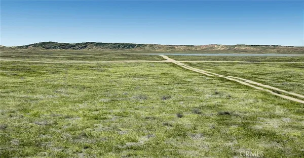 a view of an ocean from a mountain