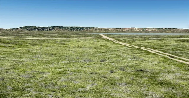 a view of an ocean from a mountain