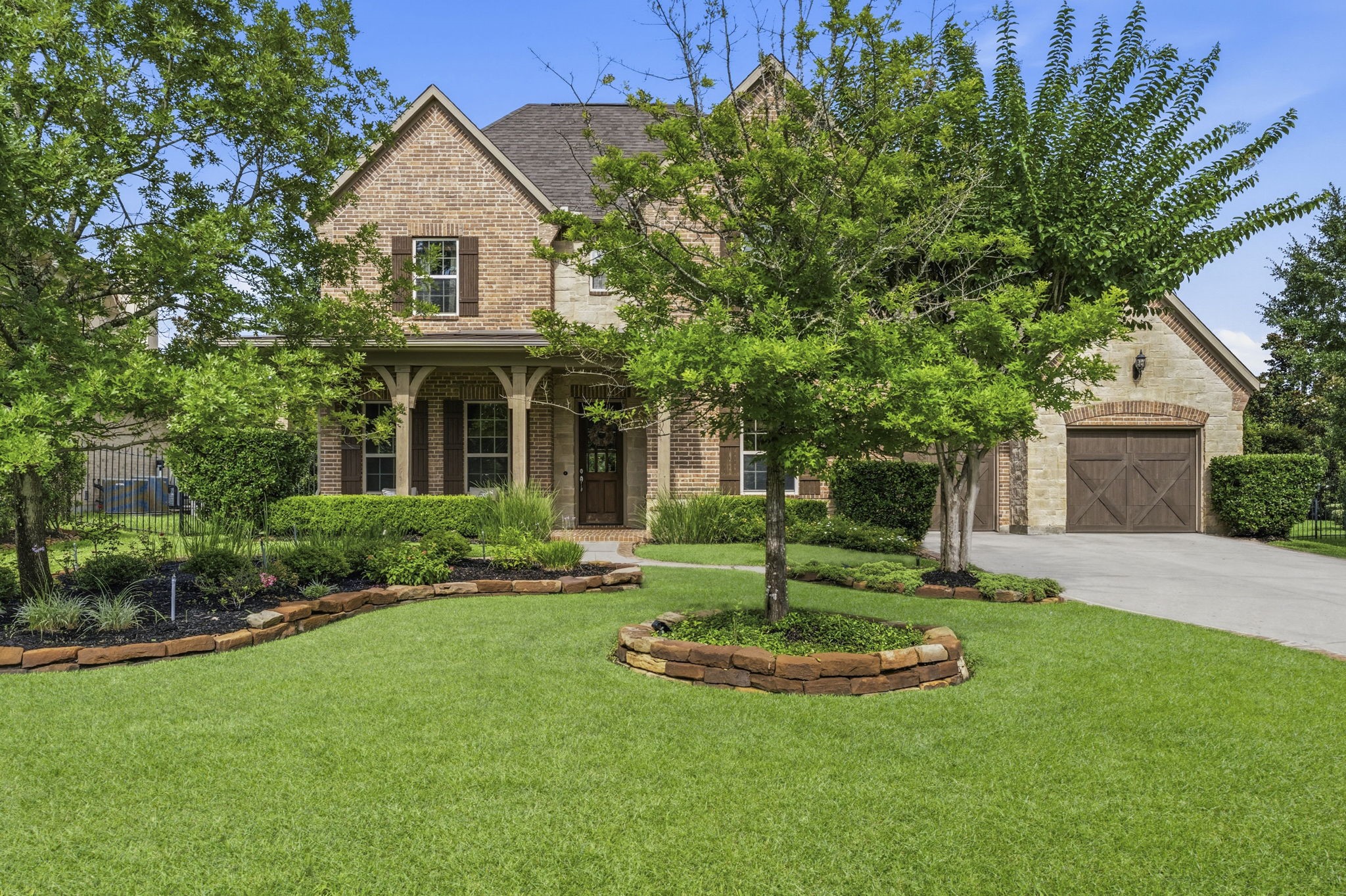 10 Spincaster Drive Spring, TX 77389 - Photo 1 of 38 Beautifully updated 5 bedroom, 5.5 bathroom, turnkey home in Creekside Park
