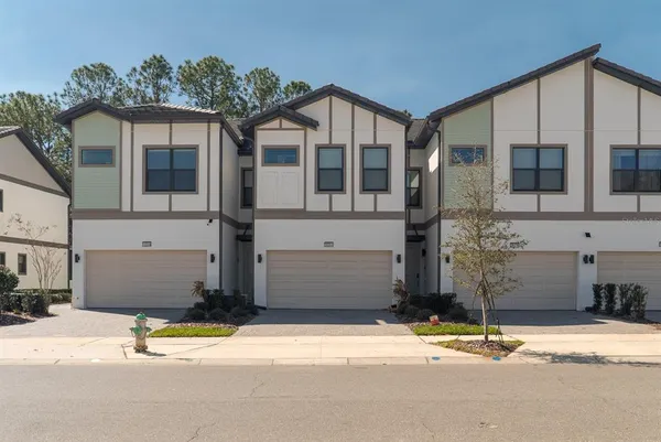 a view of a house with a street