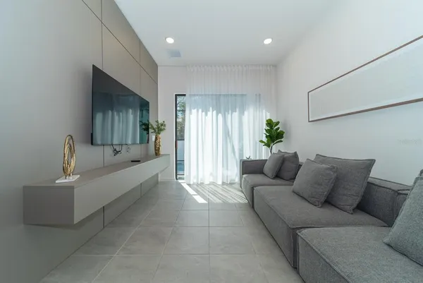 a view of a couches in back of a building