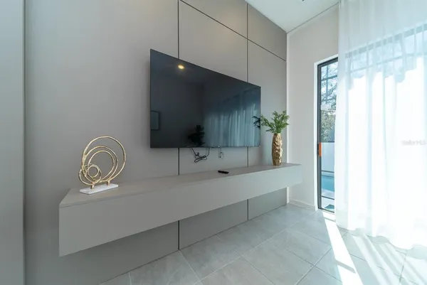 a bathroom with a toilet sink and shower