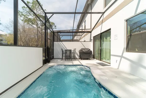 a view of a workspace with furniture