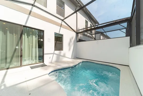 a view of a hallway with closet