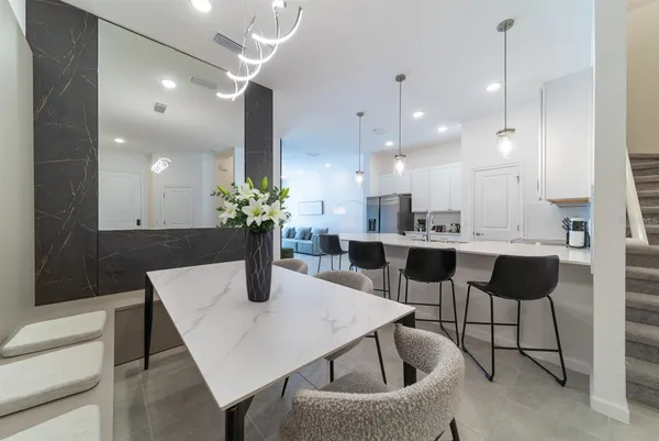 a view of a dining room with furniture