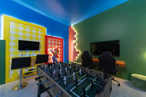 a en suite bathroom with a sink and a mirror