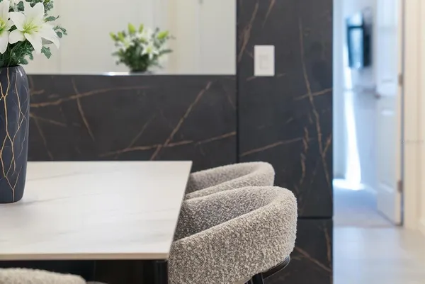 a kitchen with a stove a refrigerator and a sink