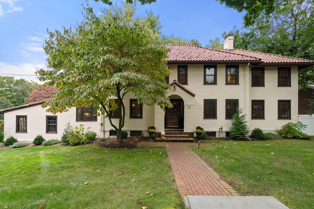 26 Larch Road Newton, MA 02468 - Photo 1 of 34 a front view of a house with a yard